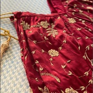 Red silk lehenga/skirt w/blouse. Hand embroidery.